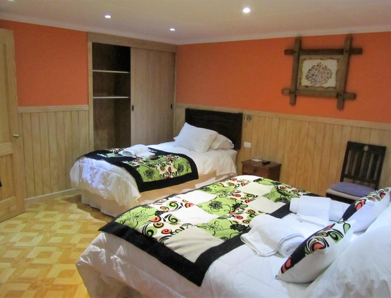 Patagonia Swiss House Hotel ปวยร์โตนาตาเลส ภายนอก รูปภาพ